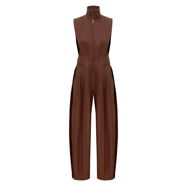 Elevate your elegance in this Zimmermann Jumpsuit available now at Coveti