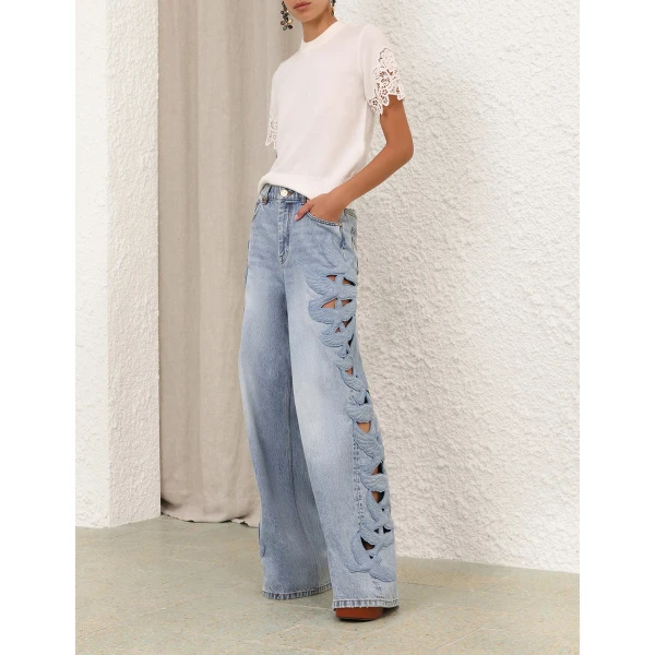 Elevate your elegance in this Zimmermann Tops available now at Coveti