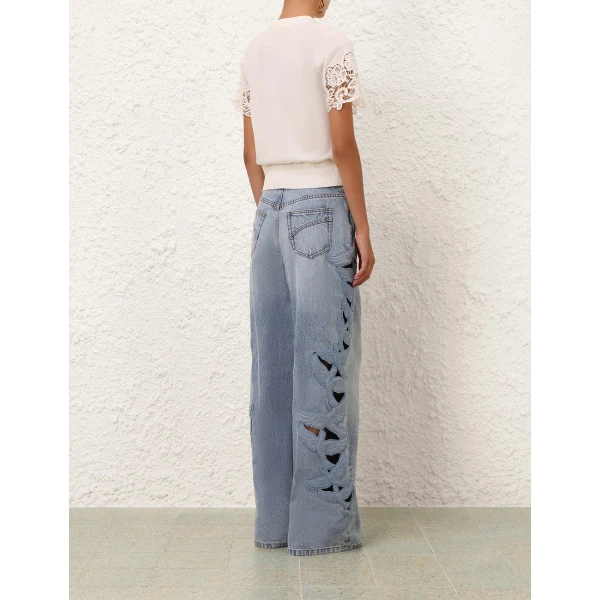 Elevate your elegance in this Zimmermann Tops available now at Coveti