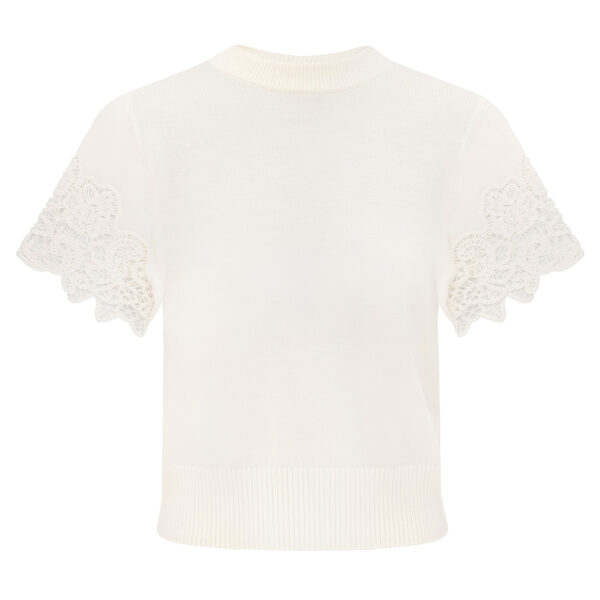 Elevate your elegance in this Zimmermann Tops available now at Coveti
