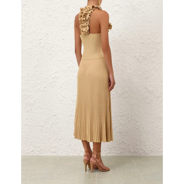 Elevate your elegance in this Zimmermann Tops available now at Coveti