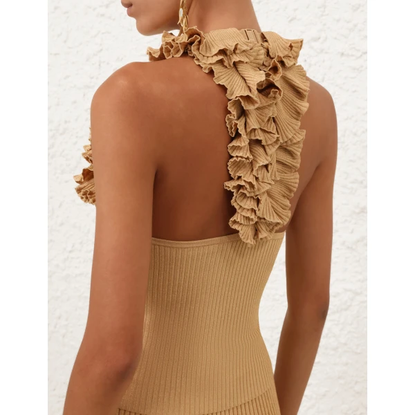 Elevate your elegance in this Zimmermann Tops available now at Coveti