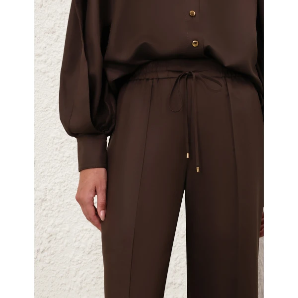 Elevate your elegance in this Zimmermann Pants available now at Coveti