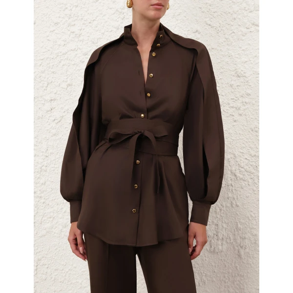 Elevate your elegance in this Zimmermann Tops available now at Coveti