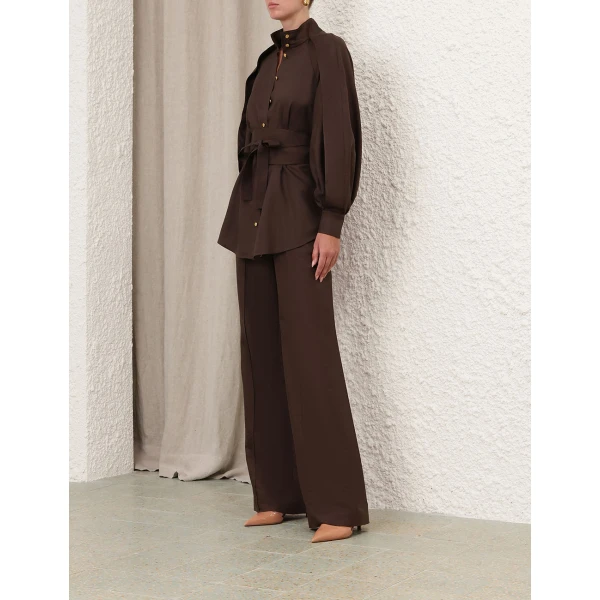 Elevate your elegance in this Zimmermann Tops available now at Coveti