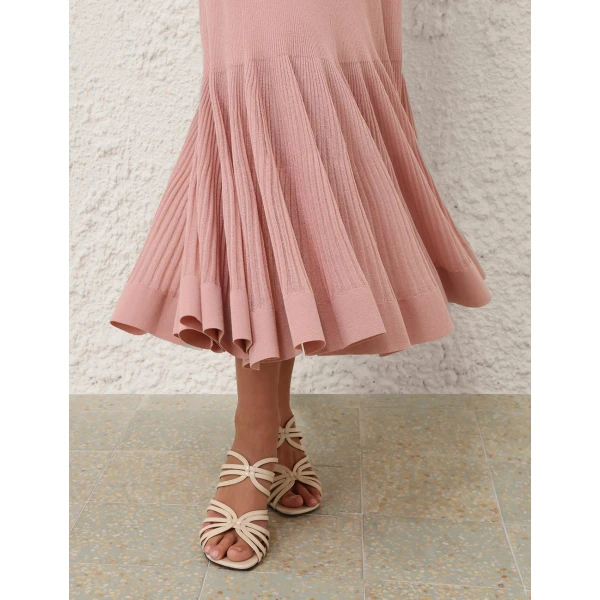 Elevate your elegance in this Zimmermann Skirts available now at Coveti