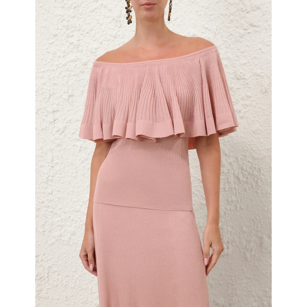 Elevate your elegance in this Zimmermann Tops available now at Coveti