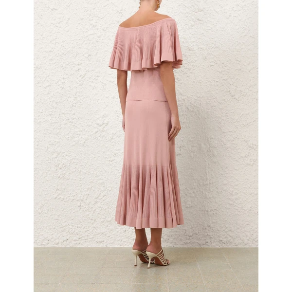 Elevate your elegance in this Zimmermann Tops available now at Coveti