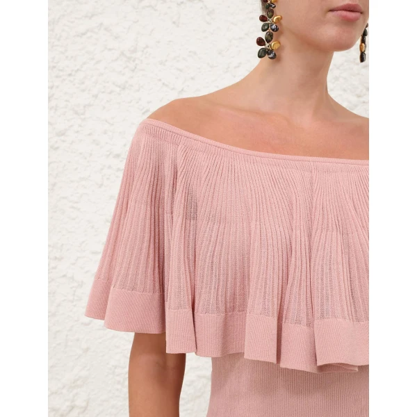 Elevate your elegance in this Zimmermann Tops available now at Coveti