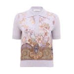 Elevate your elegance in this Zimmermann Tops available now at Coveti