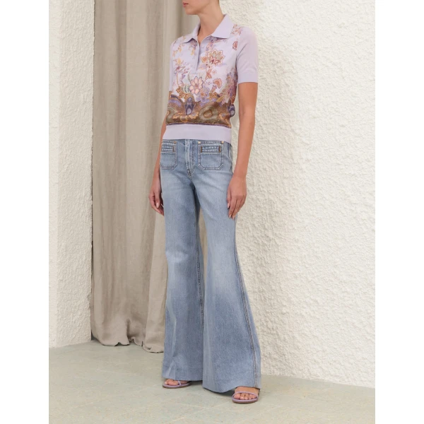 Elevate your elegance in this Zimmermann Tops available now at Coveti