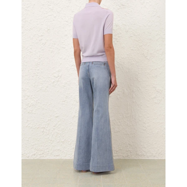 Elevate your elegance in this Zimmermann Tops available now at Coveti