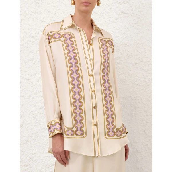 Elevate your elegance in this Zimmermann Tops available now at Coveti