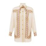 Elevate your elegance in this Zimmermann Tops available now at Coveti