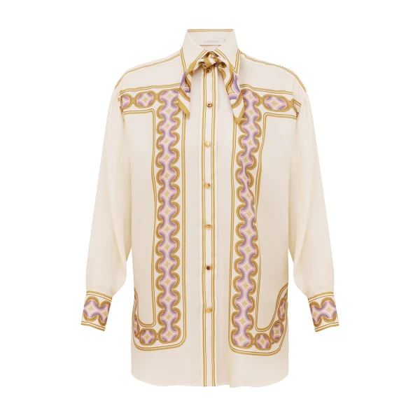 Elevate your elegance in this Zimmermann Tops available now at Coveti
