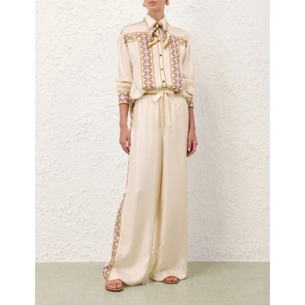 Elevate your elegance in this Zimmermann Pants available now at Coveti