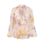 Elevate your elegance in this Zimmermann Tops available now at Coveti