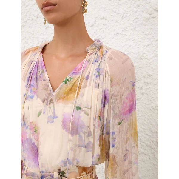 Elevate your elegance in this Zimmermann Tops available now at Coveti