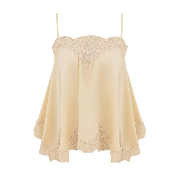 Elevate your elegance in this Zimmermann Tops available now at Coveti
