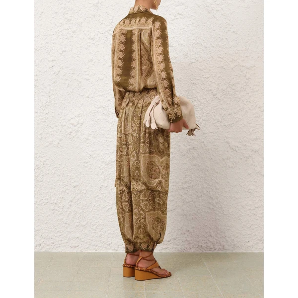 Elevate your elegance in this Zimmermann Pants available now at Coveti