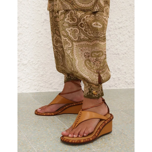 Elevate your elegance in this Zimmermann Pants available now at Coveti