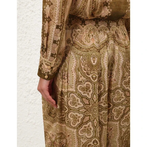 Elevate your elegance in this Zimmermann Tops available now at Coveti