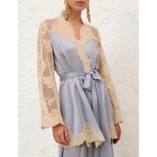 Elevate your elegance in this Zimmermann Tops available now at Coveti