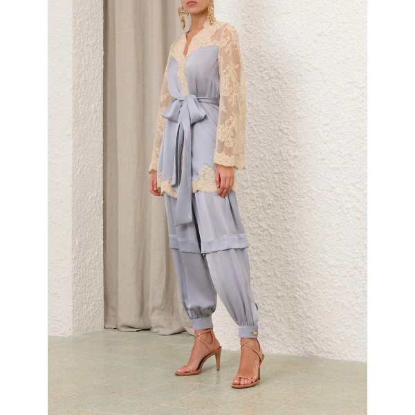 Elevate your elegance in this Zimmermann Tops available now at Coveti