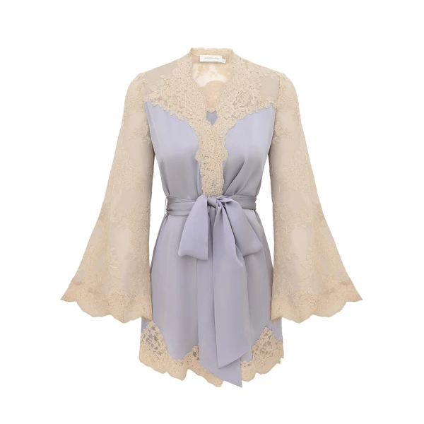 Elevate your elegance in this Zimmermann Tops available now at Coveti
