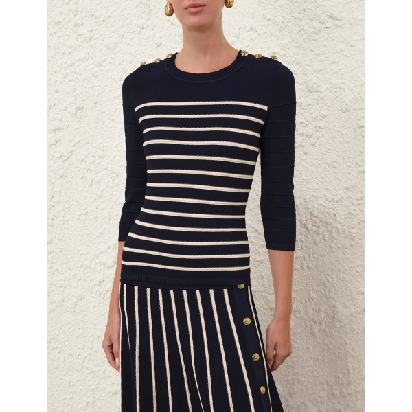 Elevate your elegance in this Zimmermann Tops available now at Coveti