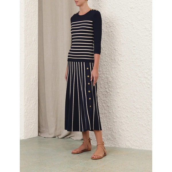 Elevate your elegance in this Zimmermann Tops available now at Coveti