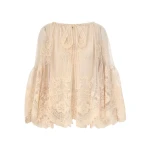 Elevate your elegance in this Zimmermann Tops available now at Coveti