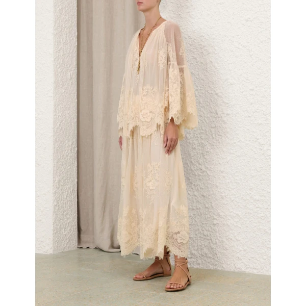 Elevate your elegance in this Zimmermann Tops available now at Coveti