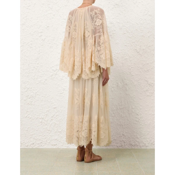 Elevate your elegance in this Zimmermann Tops available now at Coveti