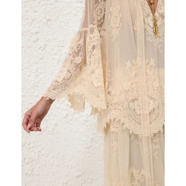 Elevate your elegance in this Zimmermann Tops available now at Coveti