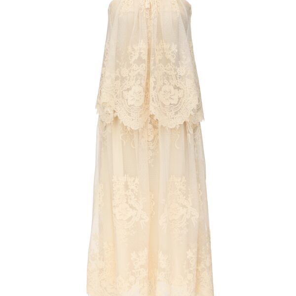 Elevate your elegance in this Zimmermann Tops available now at Coveti