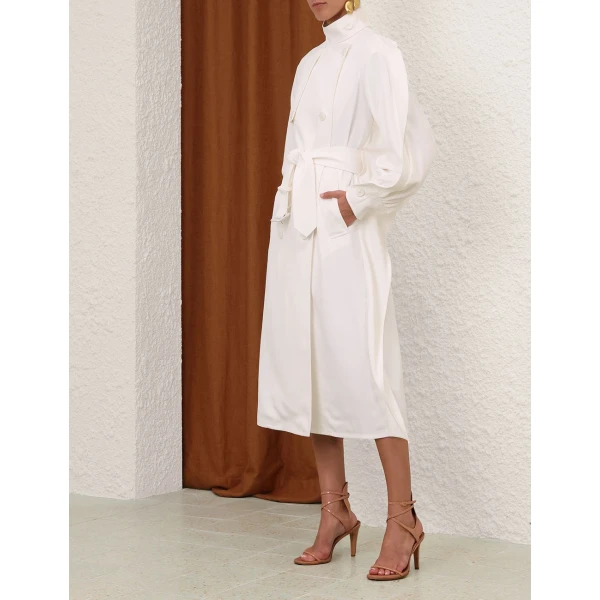 Elevate your elegance in this Zimmermann Coats available now at Coveti