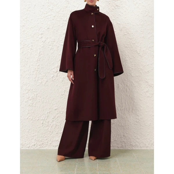 Elevate your elegance in this Zimmermann Coats available now at Coveti
