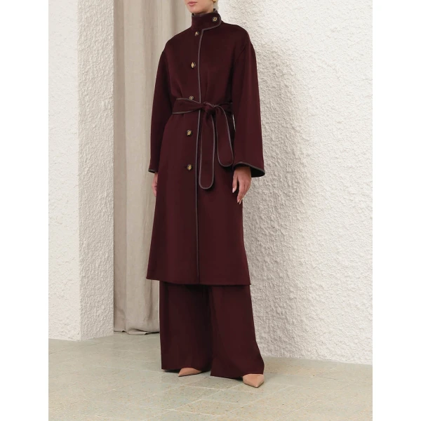 Elevate your elegance in this Zimmermann Coats available now at Coveti