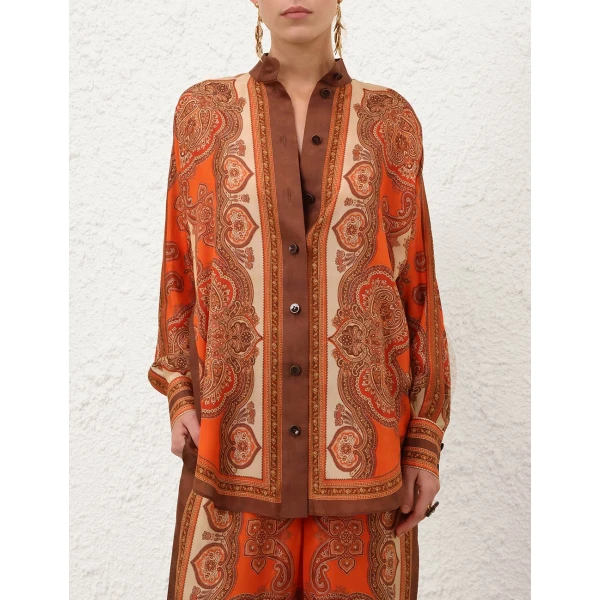 Elevate your elegance in this Zimmermann Tops available now at Coveti