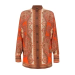 Elevate your elegance in this Zimmermann Tops available now at Coveti
