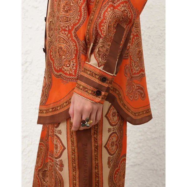 Elevate your elegance in this Zimmermann Tops available now at Coveti