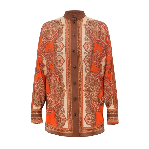 Elevate your elegance in this Zimmermann Tops available now at Coveti