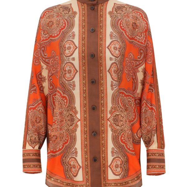 Elevate your elegance in this Zimmermann Tops available now at Coveti