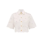Elevate your elegance in this Zimmermann Tops available now at Coveti