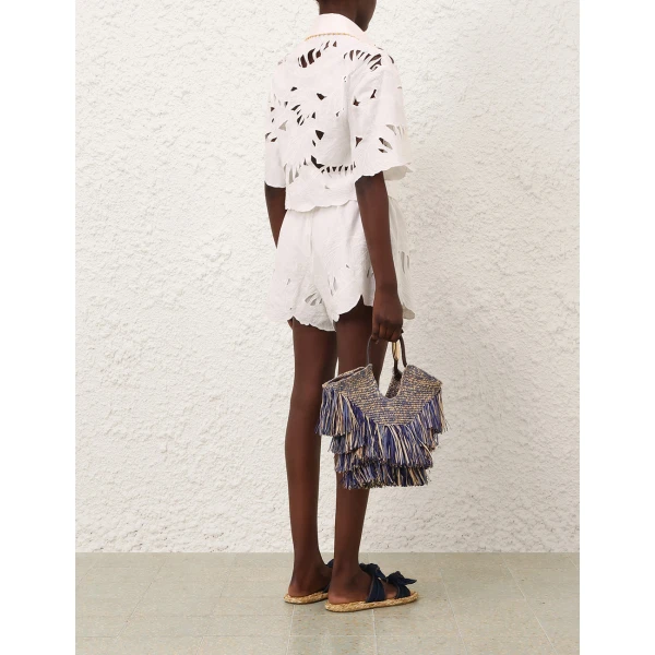 Elevate your elegance in this Zimmermann Tops available now at Coveti