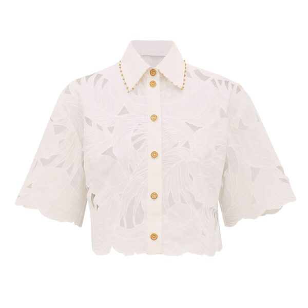 Elevate your elegance in this Zimmermann Tops available now at Coveti
