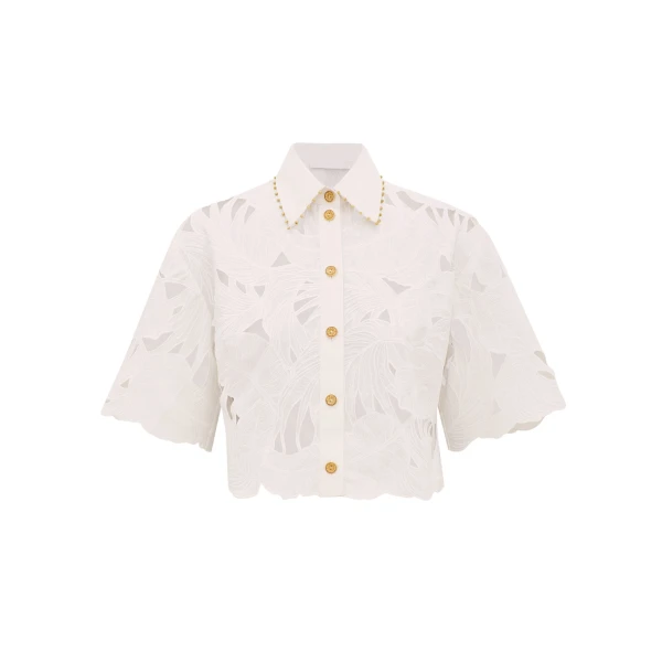 Elevate your elegance in this Zimmermann Tops available now at Coveti