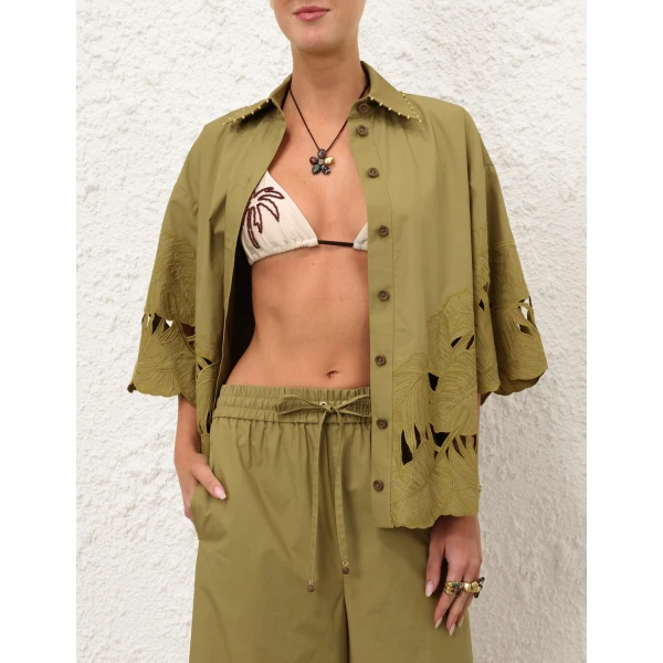 Elevate your elegance in this Zimmermann Tops available now at Coveti