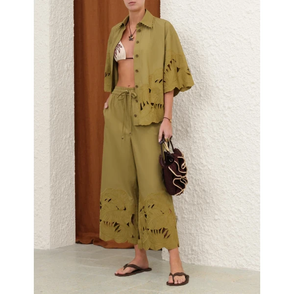 Elevate your elegance in this Zimmermann Tops available now at Coveti